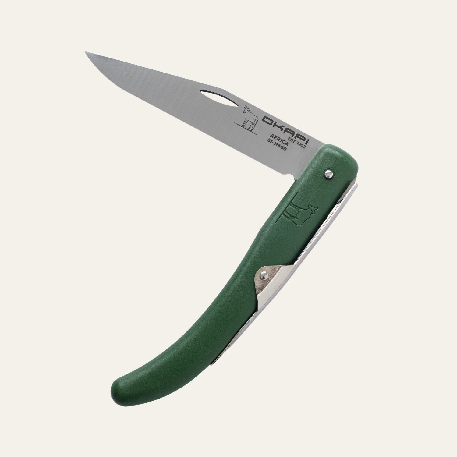 Compact Okapi knife with dark green synthetic handle resting on white background