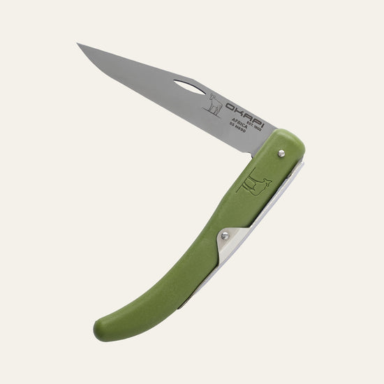 Okapi folding knife with matte olive green handle against plain white backdrop