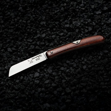 Okapi Biltong Knife โ compact fixed-blade knife with ergonomic wooden handle