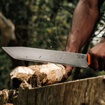 Okapi tactical machete with angular tanto blade and orange handle