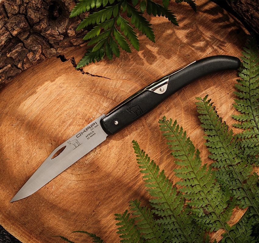 Close-up of Okapi Folding Knife with tactical black handle