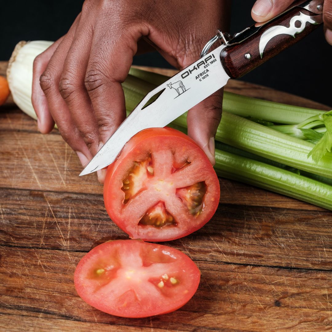 Okapi Lock Knife cutting food in lifestyle photoshoot