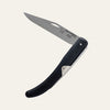 Compact Okapi folding knife with black handle for everyday carry, isolated on white