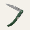 Compact Okapi knife with dark green synthetic handle resting on white background