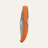 Compact Okapi utility knife with safety-orange grip, shown closed